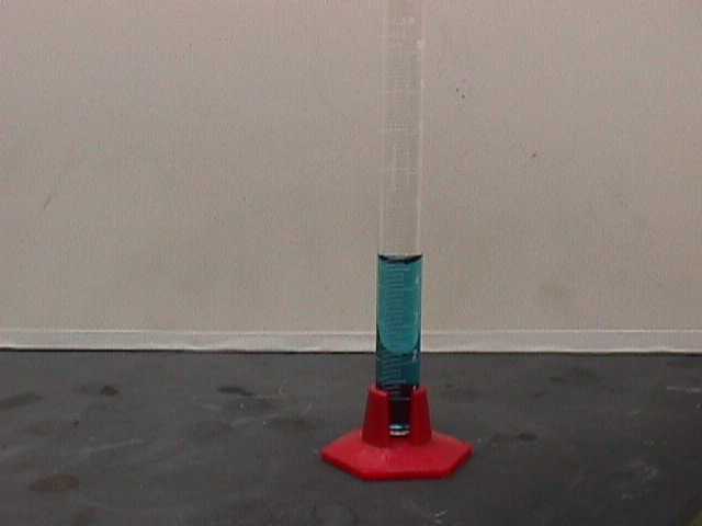 Cylinder with blue water. {104vol19.jpg (11833 bytes)}