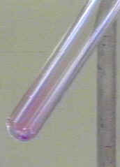 Crystal of iodine being heated [1sublim2.JPG (8430 bytes)]