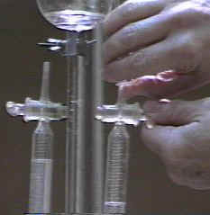 Collecting gas from electrolysis apparatus [1elect4.JPG (11092 bytes)]