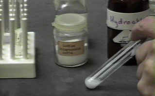 Reaction of solid sodium bicarbonate with hydrochloric acid [1rx4CO2.JPG]