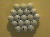 Beads showing one layer of hexagonal-close-packing.